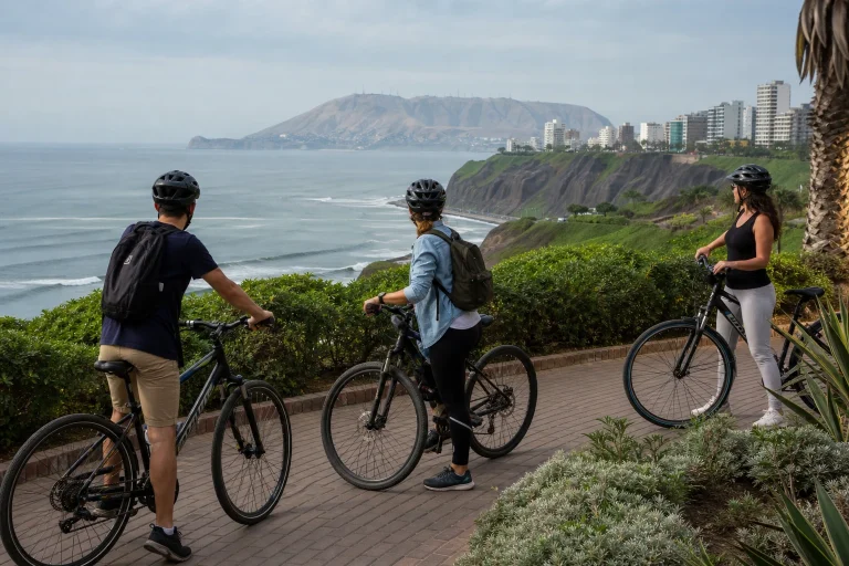 Cyclists riding along the coastal cliffs of Miraflores in Lima