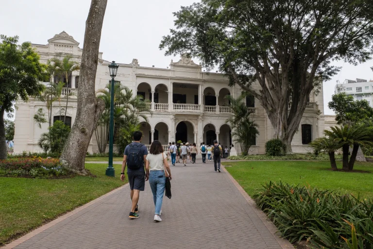 Visitors approaching a cultural site in Pueblo Libre, Lima