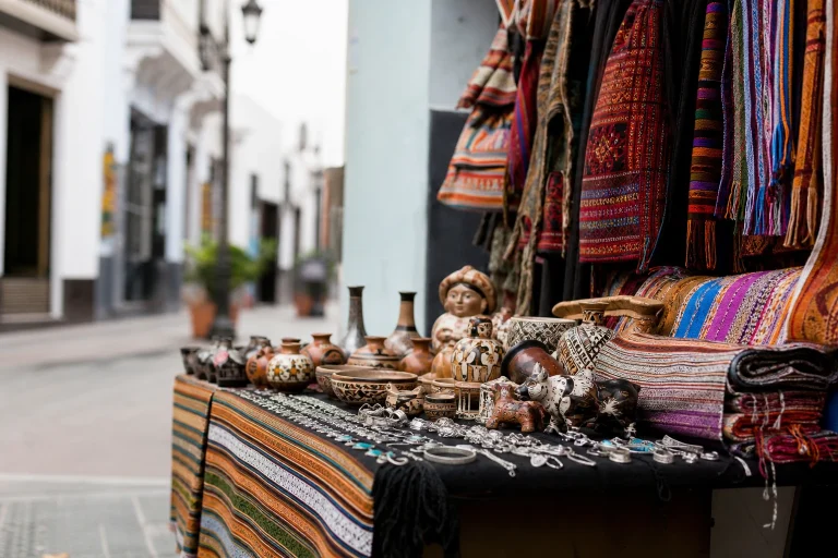 Peruvian textiles, ceramics, and jewelry at a Lima craft-shopping display