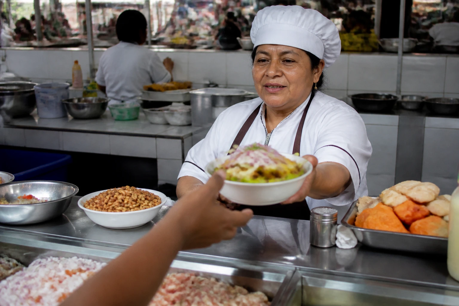 Freshly prepared meal at a Lima market counter