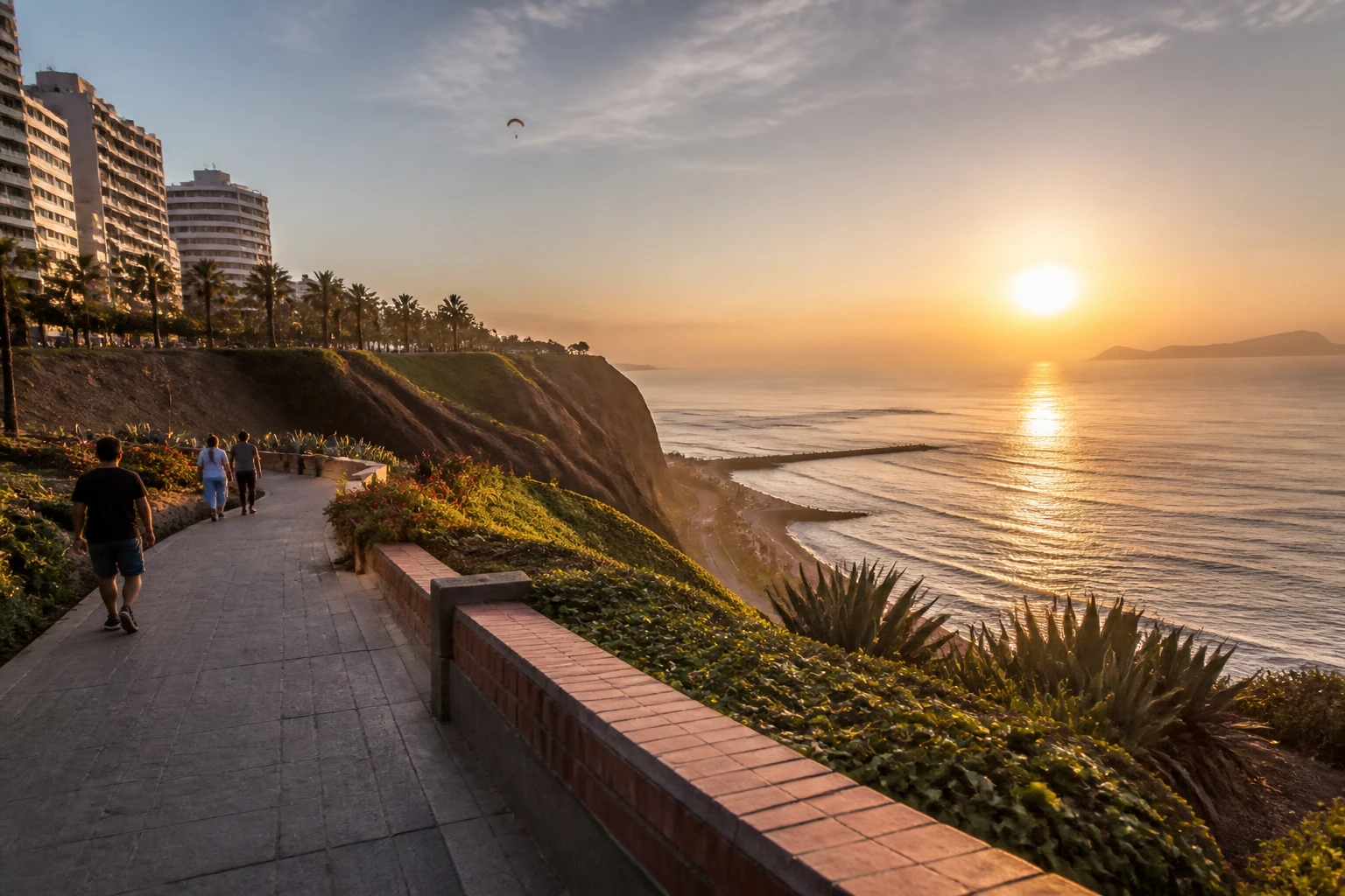 Established pedestrian path along the Miraflores malecón at sunset.