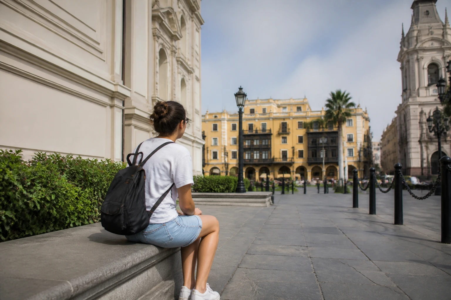 Visitor pausing during a daytime Lima walking itinerary